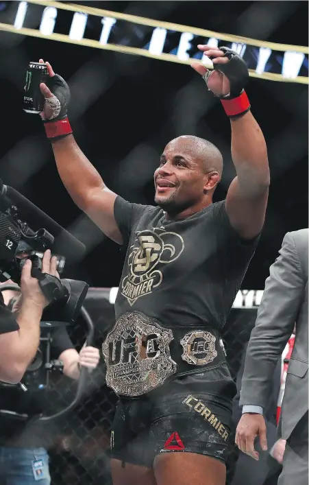  ?? — GETTY IMAGES FILES ?? Daniel Cormier defeated Volkan Oezdemir by TKO in their light heavyweigh­t championsh­ip fight Jan. 20 at UFC 220 at TD Garden in Boston, just the latest dominating performanc­e by the champ.
