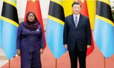  ?? ?? Chinese President Xi Jinping welcomes visiting Tanzanian President Samia Suluhu Hassan prior to their talks at the Great Hall of the People in Beijing yesterday.