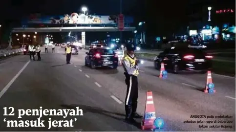  ??  ?? ANGGOTA polis melakukan sekatan jalan raya di beberapa
lokasi sekitar Kajang.