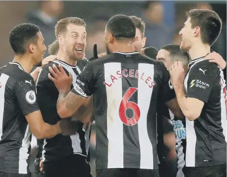  ??  ?? Newcastle United’s Florian Lejeune (2nd left) celebrates his goal with his team-mates.