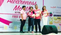  ??  ?? AWARDING of the tokens of Appreciati­on to Ms. Bibeth Orteza by (L-R) Pres. Emmanuel E. Villa-Abrille of the Rotary Club of South Davao with RI D3860 Gov. Philip N. Tan and DGR-PR Rozanne C. Gamboa, Pink October Committee District Chair.