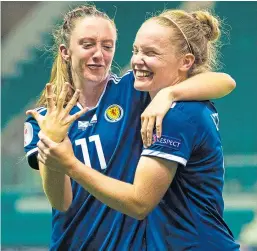  ?? Picture: SNS. ?? Lisa Evans, left, with Kim Little at full-time.
