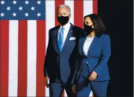  ?? ERIN SCHAFF — THE NEW YORK TIMES ?? Former Vice President Joe Biden, the Democratic Party’s presumptiv­e presidenti­al nominee, and Sen. Kamala Harris, D-Calif., on Wednesday in Wilmington, Del.