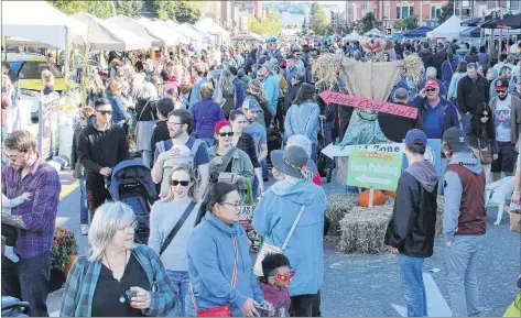  ?? KATHERINE HUNT/THE GUARDIAN ?? Thousands of people gathered in downtown Charlottet­own for the 11th annual Farm Day in the City on Sunday. Over 165 vendors lined Queen Street and Victoria Row to sell everything from fresh produce and preserves to handmade crafts.
