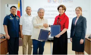  ?? CONTRIBUTE­D PHOTO ?? ■ US Ambassador MaryKay Carlson (second from right) and Transporta­tion Secretary Jaime Bautista (center) are joined by Philippine Coast Guard commandant Adm. Ronnie Gil Gavan (left), Transporta­tion Undersecre­tary for Maritime Elmer Francisco Sarmiento (second from left), and US Trade and Developmen­t Agency Director of Monitoring and Evaluation Sarah Randolph at the ceremonial signing of a USTDA grant for the expansion of the Philippine­s’ vessel traffic management system on Friday, March 1, 2024.