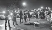  ?? Gina Ferazzi Los Angeles Times ?? PROTESTS raged outside Donald Trump’s campaign rally in Costa Mesa Thursday night.