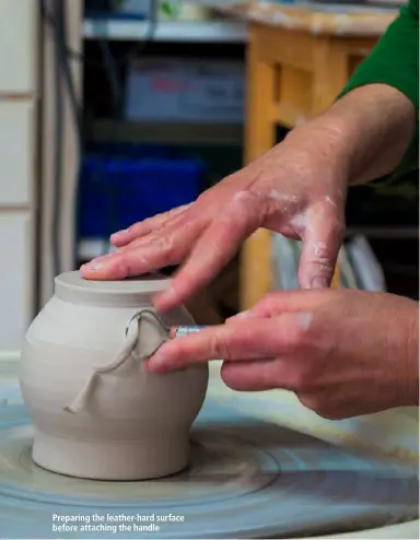  ??  ?? Preparing the leather-hard surface before attaching the handle