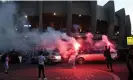  ?? Fife/AFP/Getty Images ?? Paris Saint-Germain fans gather at the Parc des Princes after Kylian Mbappé announced his departure. Photograph: Franck