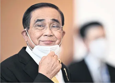  ?? AFP ?? Prime Minister Prayut Chan-o-cha arrives to attend the “Apec Leaders’ Dialogue with Abac” event during the Asia-Pacific Economic Cooperatio­n (Apec) summit in Bangkok yesterday.