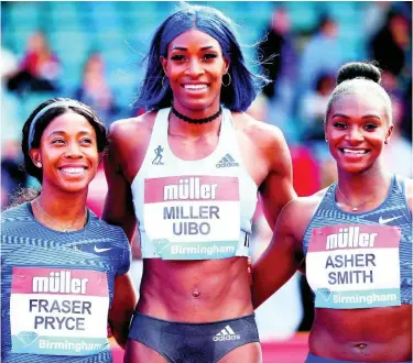  ?? AP PHOTOS ?? The Bahamas Shaunae Miller-Uibo (centre) poses after winning the women’s 200m final at the Birmingham leg of the Diamond League alongside second-place Dina Asher-Smith of Great Britain (right) and third-place Shelly-Ann Fraser-Pryce of Jamaica.