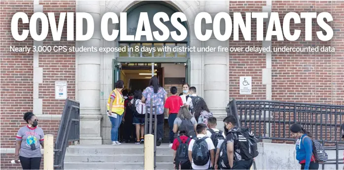  ?? ANTHONY VAZQUEZ/SUN-TIMES ?? Students wait in line as they return to school on the first day of classes last month at Alessandro Volta Elementary School in the Albany Park neighborho­od.