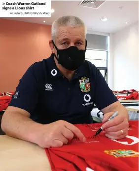  ?? All Pictures: INPHO/Billy Stickland ?? > Coach Warren Gatland signs a Lions shirt