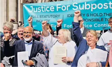  ?? ?? Former sub-postmaster­s celebrate in 2021 after some conviction­s were overturned. Their plight was highlighte­d in an ITV drama