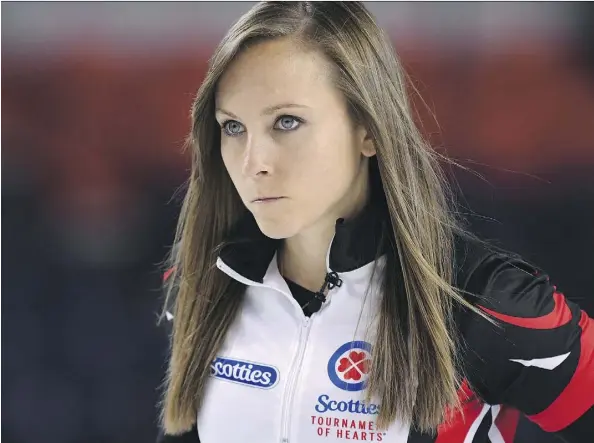  ?? SEAN KILPATRICK/THE CANADIAN PRESS ?? Ontario skip Rachel Homan, seen steely-eyed during a match against Newfoundla­nd at the Scotties Tournament of Hearts in St. Catharines, Ont., on Wednesday, “is actually very warm, really funny and one of my best friends,” team lead Lisa Weagle says.