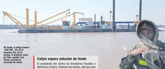  ?? ?? De fondo, la draga Damen -CSD 500 - 03, de la empresa TyC. En la lancha, el prefecto naval de Pilar, capitán Luis Torres, durante el recorrido de rutina.