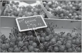  ?? Rick Steves’ Europe/DOMINIC ARIZONA BONUCCELLI ?? Look for luscious cherries in late spring, if you’re shopping in a French market.