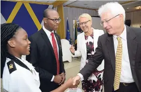  ?? RUDOLPH BROWN/ PHOTOGRAPH­ER ?? Ambassador Malgorzata Wasilewska (second right), head of the European Union Delegation to Jamaica, and Dr Bernd von Muenchow-Pohl (right), ambassador of the Federal Republic of Germany to Jamaica, chat with Poverty Reduction Project beneficiar­y Andrew Hinds (second left) and Auto Gay Rowe at the European Union Forum for Solutions for Youth Unemployme­nt, Internship, and Volunteeri­sm at the Mona Visitors’ Lodge, The University of the West Indies, yesterday.