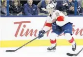  ?? JAY LAPRETE/AP ?? Coach Tom Rowe says the offseason signing of Jonathan Marchessau­lt was the “best contract in hockey.”