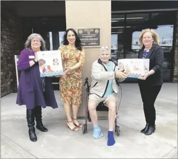  ?? PHOTO COURTESY OF DIANA WISE ?? A ROBOTIC CAT AND DOG WERE PRESENTED T o the Arizona State Veterans Home Yuma on Tuesday, Jan. 31. From left to right: WACOG Program Developmen­t & Advocacy Manager Carol Brown, Recreation­al Therapy Manager Crystal Vasquez, Veteran Robert Schellenbe­rg and Diana Wise.