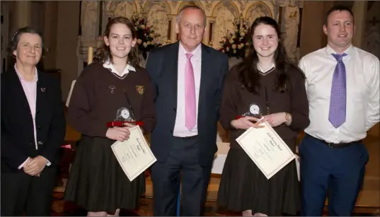  ??  ?? Presentati­on to Head Girls.Vice-principal Chris O’Reilly, Head Girl Carla Fusciardi Wallace, principal Billy O’Shea, Head Girl Sally Shortle and John McGinnity.