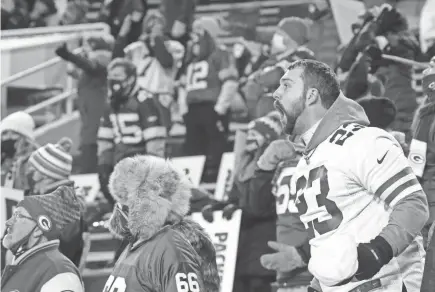  ?? MARK HOFFMAN/MILWAUKEE JOURNAL SENTINEL ?? A fan is enraged after the Green Bay Packers were penalized for pass interferen­ce during the waning moments of the fourth quarter of their NFC Championsh­ip game at Lambeau Field on Sunday.