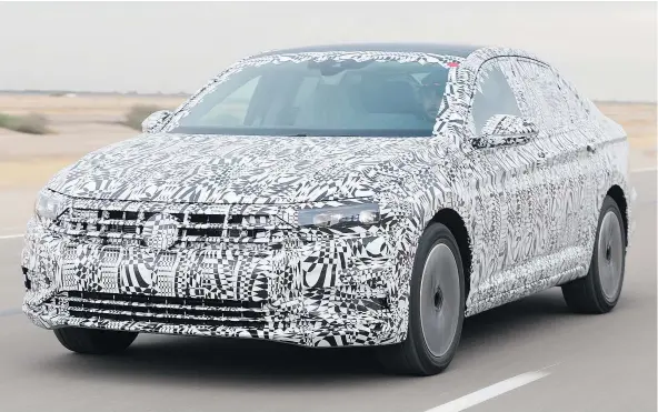  ?? — PHOTOS: VOLKSWAGEN ?? 2019 Volkswagen Jetta in camouflage. The seventh generation Jetta will be unveiled next month in Detroit.