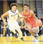  ?? AMYSHORTEL­L/THE
MORNING CALL ?? Parkland’s Trey Rolle drives up the court against Allen’s Nate Ellis during the Eastern Pennsylvan­ia Conference semifinals last February at PPL Center. The Trojans were 15-10 last season.