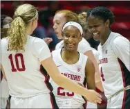  ?? THE ASSOCIATED PRESS FILE ?? Kiana Williams, center, scored six points in the final 12 seconds to lead Stanford to a 69-66 win over Colorado Sunday.