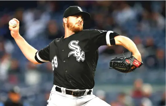  ??  ?? White Sox rookie starting pitcher Dylan Covey allowed eight runs and 10 hits in five innings Wednesday night against the New York Yankees. | SETH WENIG/ AP