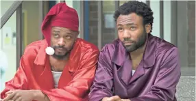  ?? FX VIA AP ?? Lakeith Stanfield, left, and Donald Glover appear in a scene from the FX comedy series “Atlanta.”