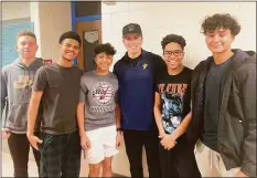  ?? Will Aldam / Hearst Connecticu­t Media ?? Members of the Danbury High School baseball team met with Savannah Banana baseball player Jackson Olson Tuesday. Olson, a former standout at New Milford, talked about the importance of chasing dreams.