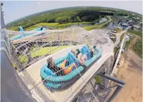  ?? CHARLIE RIEDEL/ ASSOCIATED PRESS ?? Riders go down the water slide called “Verruckt” at a Kansas City, Kan., water park in 2014. A grand jury indicted Schilitter­bahn Waterpark and an ex-manager for manslaught­er and other charges on Friday.