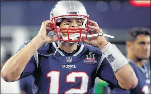  ?? AP PHOTO ?? New England Patriots quarterbac­k Tom Brady adjusts his helmet on the sideline during the first half of an NFL game against the Kansas City Chiefs on Sept. 7 in Foxborough, Mass.