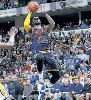  ?? JOE ROBBINS/GETTY IMAGES ?? Cleveland Cavaliers’ all-star LeBron James drives for a basket against the Indiana Pacers in the second half of Game 4 of the Eastern Conference Quarterfin­als during the 2017 NBA Playoffs.