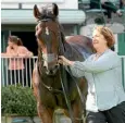  ??  ?? Seventh Up and co-owner and trainer Shelley Hale after keeping their unbeaten record intact at Tauranga.