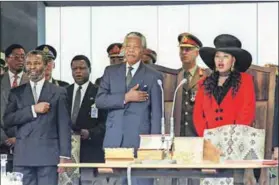  ??  ?? Shunned: Both Ibrahim and Benjamin (left) worked tirelessly for the ANC during apartheid. But only Ibrahim was invited to perform at Nelson Mandela’s inaugurati­on (above). Photo: Walter Dhladhla/AFP