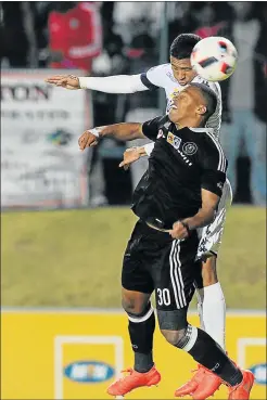  ?? Picture: GALLO IMAGES ?? HEADSTRONG: Daine Klate of Wits, back, in action with Thembela Sikhakhane of Pirates during the MTN8 match between Wits and Orlando Pirates at the Bidvest Stadium in Johannesbu­rg on Saturday