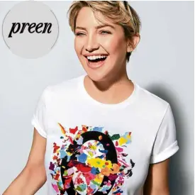  ??  ?? Kate Hudson in Michael Kors’ #WatchHunge­rStop T-shirt