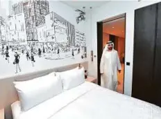  ?? WAM ?? Shaikh Mohammad at La Ville Hotel & Suites. Operated by Marriott, the property is spread over 30,000 square metres and has 180 suites and rooms.