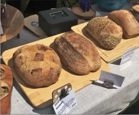  ?? LAUREN HALLIGAN — MEDIANEWS GROUP ?? NightWork Bread Co.’s products are displayed at the Spa City Farmers’ Market.