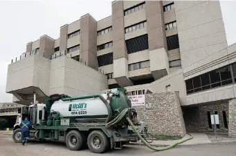 ?? GREG PENDER/The StarPhoeni­x ?? A vacuum truck is employed at the back entrance to Royal University Hospital on Tuesday to assist in a seriesof problems plaguing the hospital this week, resulting in surgeries being postponed.
