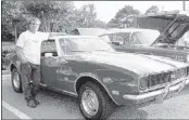  ??  ?? James Hicks, president of the Memphis Classic Chevy Club, with his 1968 Chevy Camaro will be among car enthusiast­s gathering for a special cruise-in July 12 in honor of Collector Car Appreciati­on Day.