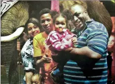  ?? FAMILY PHOTO VIA NATIONAL ACTION NETWORK — AP FILE ?? In this undated family file photo provided by the National Action Network, Eric Garner, right, poses with his children during a family outing.