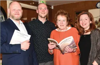  ?? Photo by Michelle Cooper Galvin ?? Mary Coffey Coghlan launching her book ‘Echoes of Dunloe’ with her nephews Sean and Seamus and niece Siobhan at Kate Kearney’s, Gap of Dunloe, Killarney on Saturday.