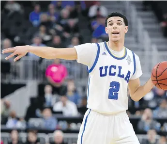  ?? ETHAN MILLER/GETTY IMAGES/FILES ?? Point guard Lonzo Ball, seen with the UCLA Bruins in March, is considered to be one of the top picks for the NBA draft in June. The draft lottery takes place tonight.