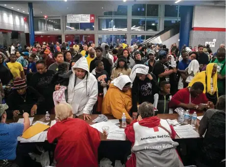  ?? Marie D. De Jesús / Houston Chronicle ?? Dozens of mentally ill evacuees who were wedged among the thousands who crammed the George R. Brown Convention Center in the days after Hurricane Harvey struck were left under-treated or with no medication at all.