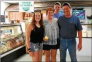  ?? LISA MITCHELL - DIGITAL FIRST MEDIA ?? The Lesher family of Bernville received the 2018 Berks County Outstandin­g Farm Family. They operate WayHar Farms and Way-Har Farm Market, a third generation family-owned country store on Route 183 in Bernville. Left to right are Olivia, 16; Lolly;...