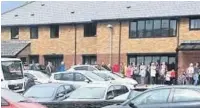  ??  ?? The queues outside the GP surgery in Llwynhendy.