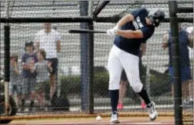  ?? LYNNE SLADKY — THE ASSOCIATED PRESS ?? The Yankees’ Greg Bird takes a swing on Thursday in Tampa, Fla.