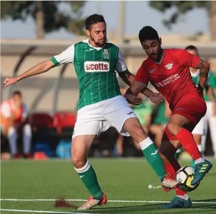  ??  ?? Action taken from a match played between Floriana and Balzan earlier on this season. Photo: Domenic Aquilina